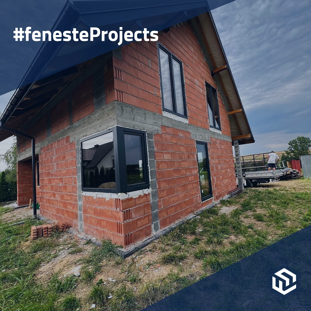 Single-family house with black windows on the outskirts of the city windows window-profiles rehau synego-perfect  